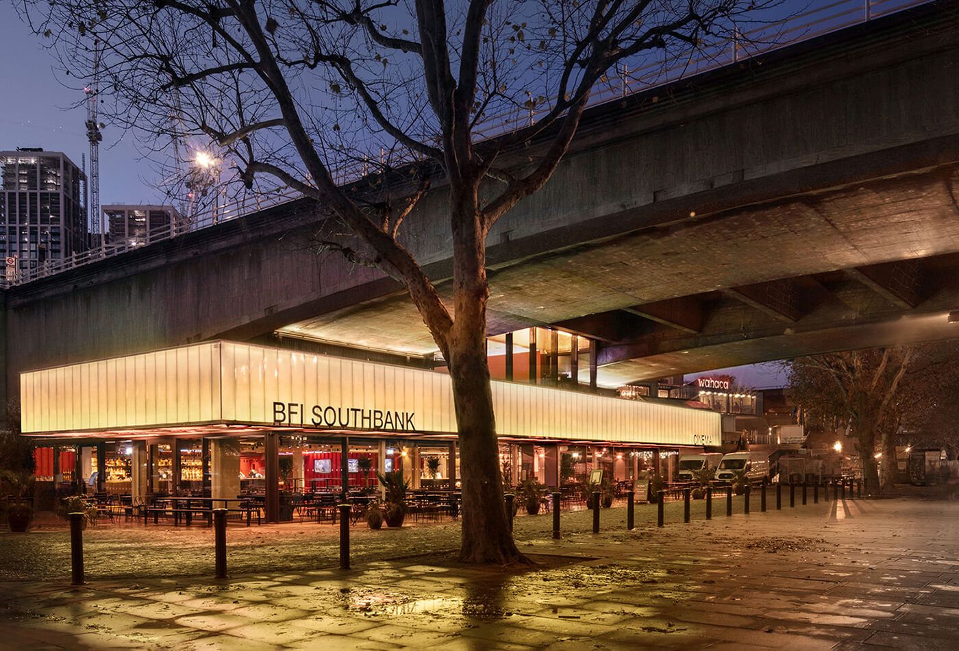 Outdoor evening shot of Southbank below a bridge