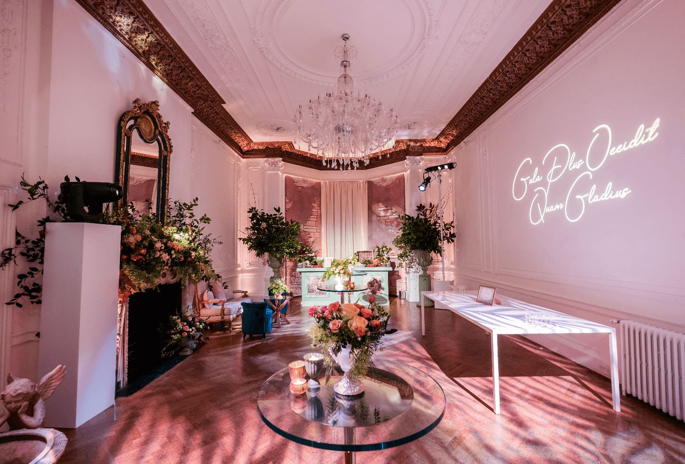 Pink floral reception room with large chandelleir.jpg