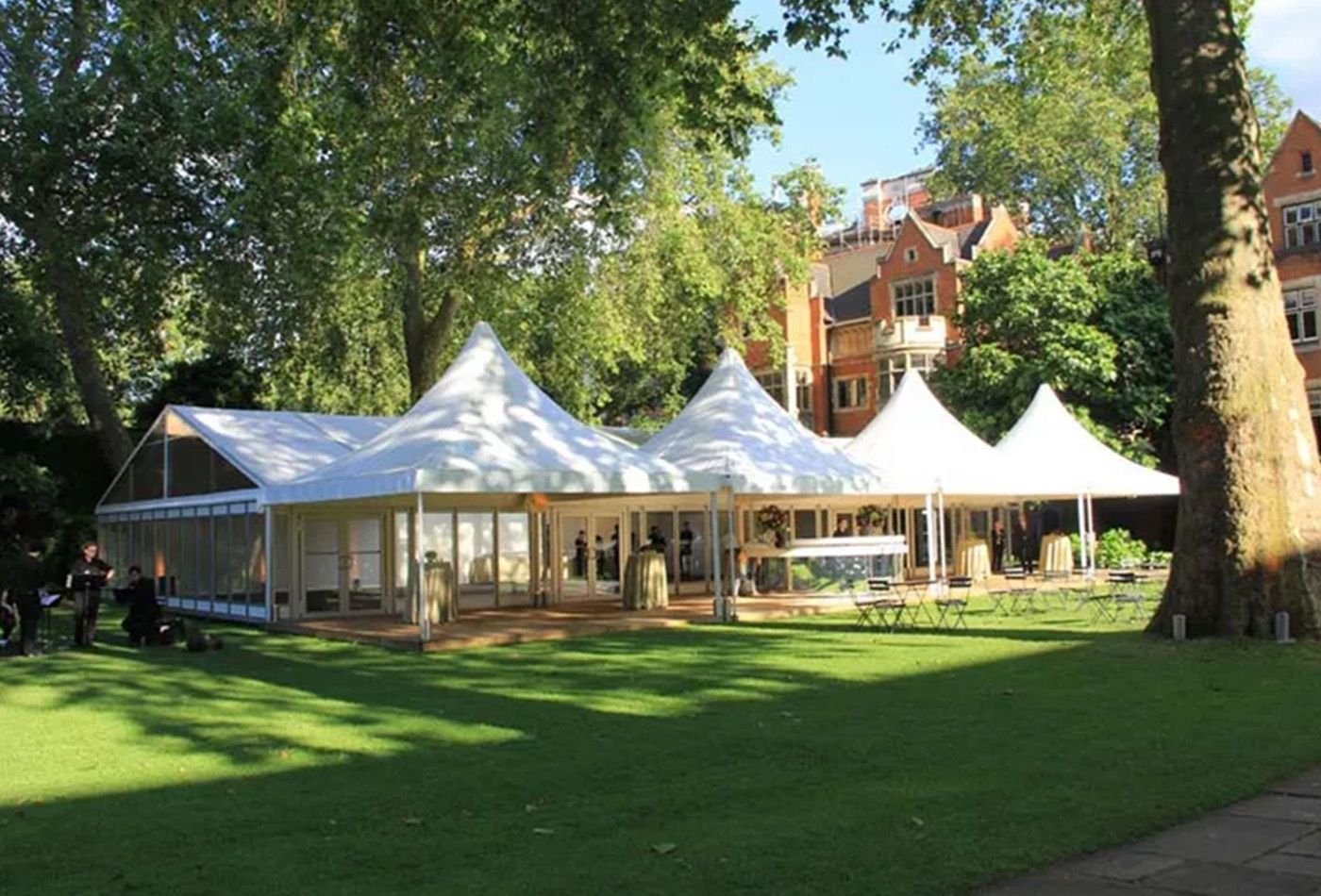 College garden in the summer with white gazebos