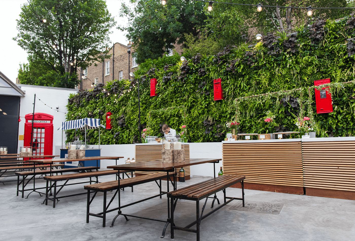 Outdoor shot of space with wood panelling and foliage.jpg