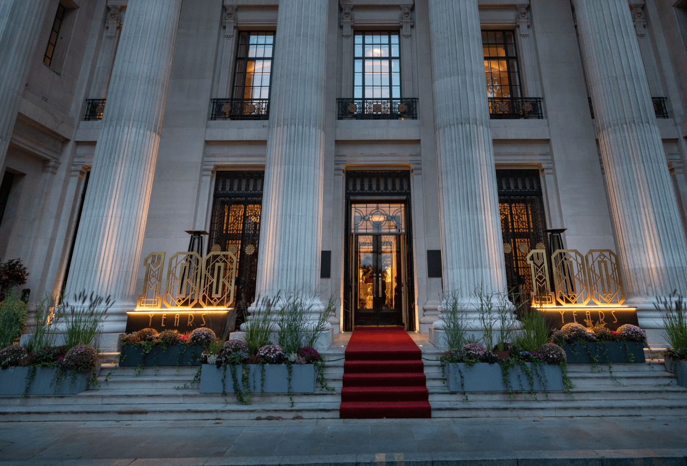 Outdoor shot of hotel, big pillars and red carpet.jpg