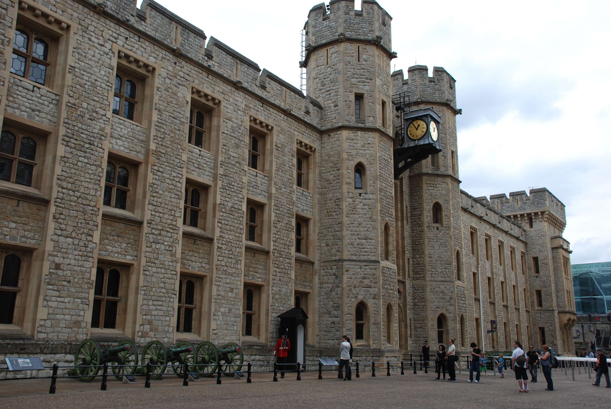 Vast stone tower with cannonball guns lined up outside