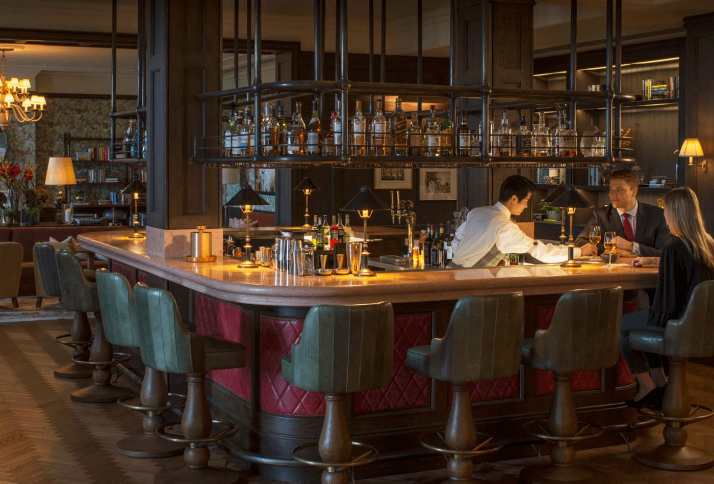 Red, green and wooden themed hotel bar.jpg