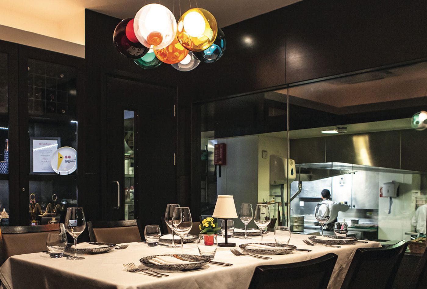 Dark dining area with colourful lighting