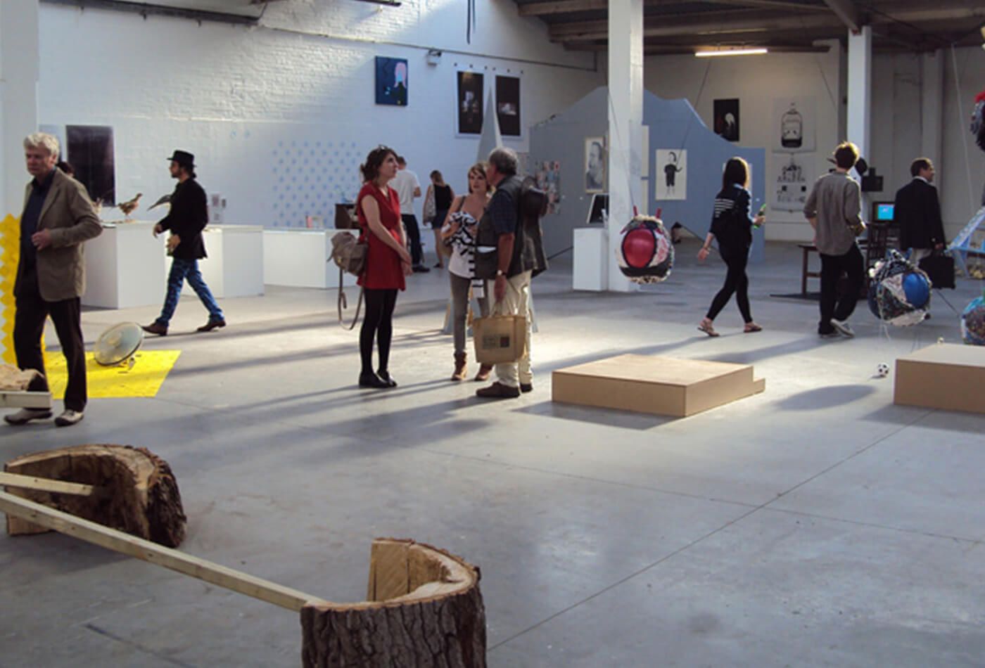 Interior shot of concrete building with exhibition