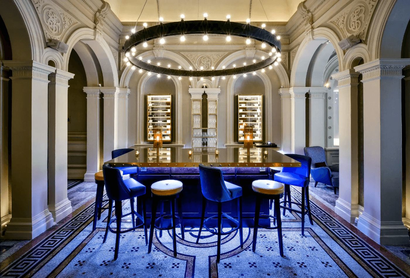 Large brass table in bar area.jpg