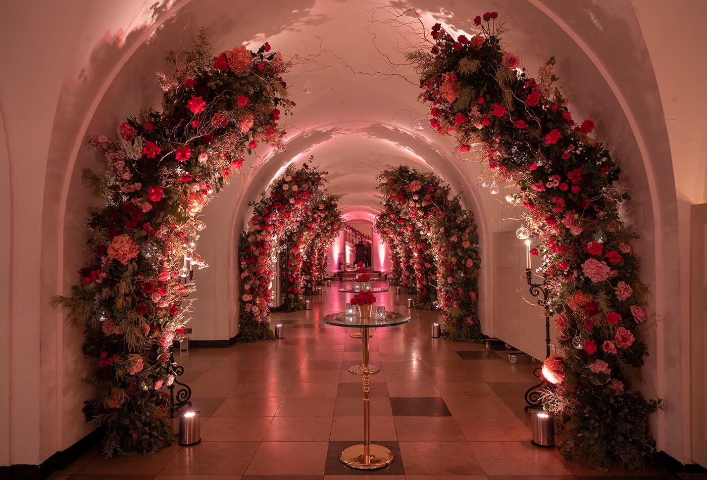 Red and pink floral arches