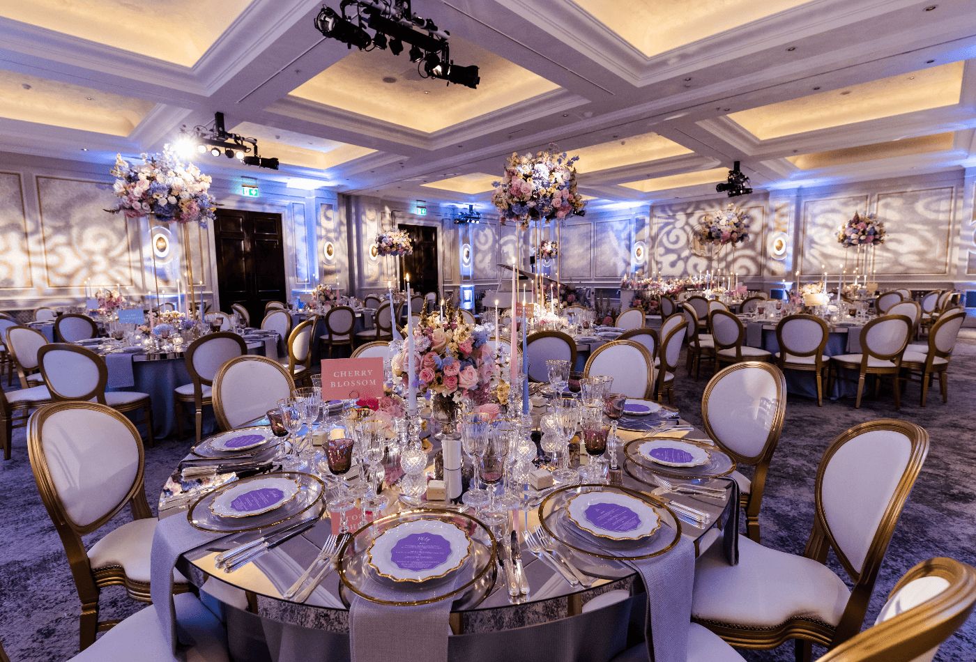 Floral indoor wedding dining set up.jpg